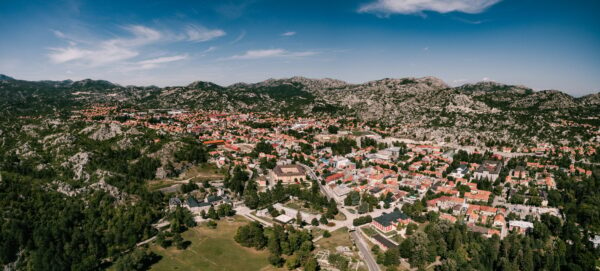 Panoramic Aerial View Of The Monastery In Cetinje Against The Backdrop Of The Town